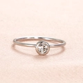 Minimalist silver stainless steel ring featuring a clear round birthstone in bezel setting - US Size 7 / Steel-White (Apr)