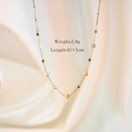 Detail of gold chain necklace with natural stones and size specs 41 plus 5cm length - Yellow Shell Necklace