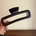 Macro shot of large black matte acetate hair claw clip with rectangular cutout design - Matte Black Rectangle Claw Clip