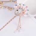 Detail of golden peacock hair pin with colorful rhinestones and pearl tassels - Gold Peacock Pearl Tassel (FZ015)
