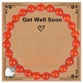 Dettaglio macro del bracciale in pietre naturali rosse con ciondolo a cuore in argento - Bracciale in Agata Rossa