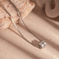 Macro shot of silver zircon cylindrical pendant with detailed weaving chain - Silver Zircon Multi-layer Necklace