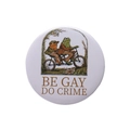 Round tinplate badge featuring Frog and Toad on a bicycle with Be Gay Do Crime text - BE GAY DO CRIME Frog Bicycle