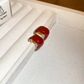Close-up of burgundy enamel C-shaped hoop earrings on a white jewelry display tray - 32# Silver Earring Post Gold Red U-Shape Enamel Buckle
