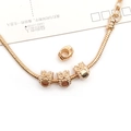 Golden owl charm bracelet with snake chain and embossed detail on white background - 1Pc Owl Bead Type A 7x10mm Hole 4mm