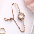 Elegant rose gold women's quartz bracelet watch with sparkling crystal encrusted bezel - Rose Gold Band White Dial