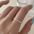 Minimalist 925 sterling silver slim ring with circular accent shown on model's finger - Thin Bead Opening Style(JZ0609)
