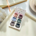 6-piece set of matte mini hair claws in assorted colors on a chic decorative tray - Oval 2.5cm