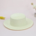 Classic beige woven straw boater hat with fine texture on soft pink background - One Size / Off White