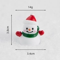 Miniature resin snowman figurine with red hat and green scarf, dimensions 3.4cm by 3.8cm - Scarf Snowman