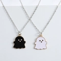 Set of two cartoon ghost necklaces with black and white drip oil pendants on silver chains - White & Black (2pcs Necklaces)