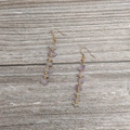 Bohemian dangle earrings with natural purple crystal stones and gold bead accents - Gold - Amethyst