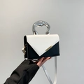 Minimalist black and white color-block handbag with artistic silver metal handle - White