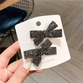 Fermagli per capelli con fiocco di strass neri, set di due accessori eleganti su carta - Coppia di Fermagli a Fiocco Incrociato