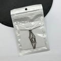 Silver geometric cage pendant necklace with metallic rod structure in fashion packaging - Cage Only