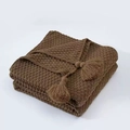 Dark brown chunky knit throw blanket with decorative tassels on a clean white background - Coffee
