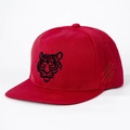Detail shot of red snapback hat with black tiger embroidery and side claw marks design - Adjustable / Red
