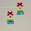Macro view of handmade beaded crystal Christmas tree earrings with a red matte bow - Multicolor Tree-Silver Pin / Stud Earrings