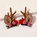 Detailed view of Christmas hair clips with plush reindeer antlers and red plaid bows - Christmas Antler Hair Clips - Bowknot Pom Coffee