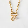 Elegante collana in acciaio al titanio placcato oro 14K con lettera U e zirconi - Lettera U