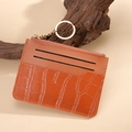 Brown crocodile pattern card holder with multiple slots, zipper, and metal keychain - Tan