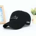 Detail of black cotton baseball cap with white Cruise and Latest letter embroidery - Adjustable / Black