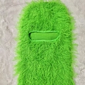 Detailed view of neon green fuzzy balaclava with long faux fur texture and single eye hole - One Size / Green