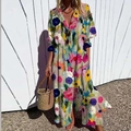Détail d'une robe longue à fleurs avec col en V et manches longues bohèmes - S / Haut Et Bas / Imprimé Floral Multicolore
