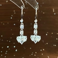 Silver heart earrings featuring large zircons and multi-layered dangling crystals - E6765 Ear Hook / Silver