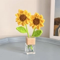 Handmade crochet sunflower car diffuser with yellow petals in a clear glass bottle - Sunflower