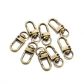 Dettaglio di moschettoni in bronzo antico con base girevole per ferramenta borse fai-da-te - 12x33mm (Confezione da 10) / Bronzo Antico
