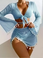 Detail of sky blue mesh beach cover-up with white tassel edges and bow tie-front closure - S / Sky Blue