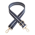 Detail of adjustable blue nylon strap with white chevron pattern and gold metal hardware - Blue