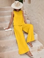 Detail of yellow two-piece summer set showing the high-waisted wide-leg knit trousers - S / Yellow