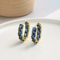 Chic gold hoop earrings with rectangular blue zircon stones on a white ceramic tray - Blue (ZYN-DME454G-3)