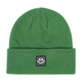Close-up of a green knitted beanie featuring a black square rubber smiley face patch - Dark Green