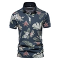 Close-up of high-quality navy polo shirt with tropical floral print and pique texture - Royal Blue (2235)