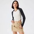 Slim fit hooded long sleeve crop top in contrast colors with cargo mini skirt - S / Black and White