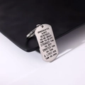 Close-up of engraved stainless steel dog tag keychain for granddaughter with inspirational text - Style 12 (To Granddaughter)