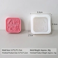 Square silicone DIY mold with lucky character and a pink handmade soap sample - Earthly Treasure