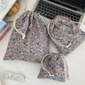 Set dettagliato di tre sacchetti con coulisse floreali in varie misure per viaggi - Piccolo (14 * 16 cm) / Fiori blu