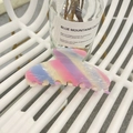 Large acetate hair claw clip with colorful candy stripes on a white metal chair - Approx 10.5cm / Pink Blue Handmade Stripe