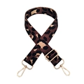 Macro view of leopard print nylon bag strap with polished gold hardware buckles - Silver Clasp / Coffee Leopard