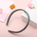 Simple grey plush fabric headband for women with a soft velvet texture on pink background - Gray
