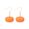 Detailed view of orange pumpkin earrings with gold hooks on a clean white background - Resin Pumpkin