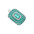Macro shot of silver pendant with pave green crystals and a large emerald-cut centerpiece - Platinum Green Zirconia