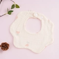Petal-shaped baby bib in white cotton gauze with pink tulip floral print and snaps - Rose