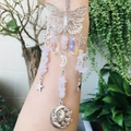 Silver butterfly suncatcher detail with pink crystals and celestial sun moon charms - Rose Quartz