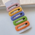 Detail of 5-piece PU leather hair clip set with diamond texture in vibrant pastel colors - Bright Rhombus Oval