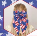 US flag pattern bow hair clip worn by blonde woman for Independence Day celebration - Spring Clips / Navy Blue and Red